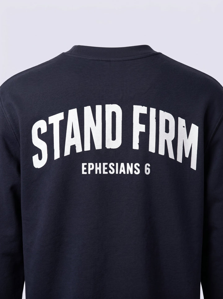 Detail van de Stand Firm rugprint op de Ink Blue sweater